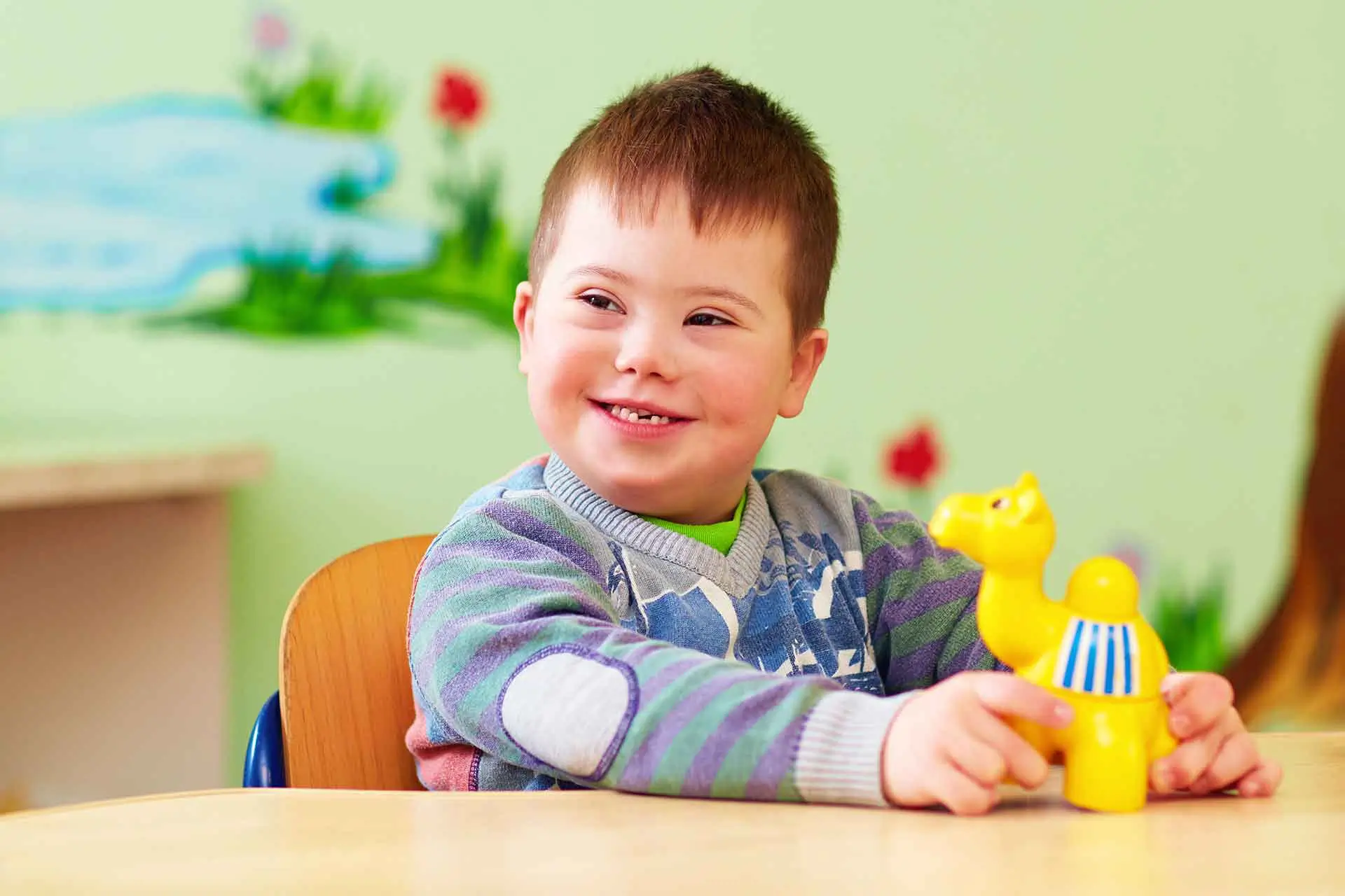 A child with Down syndrome instilling a good behavior